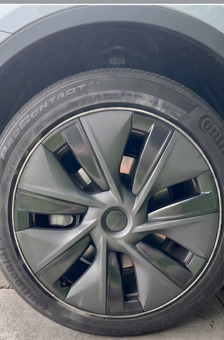 Tesla wheel before repair