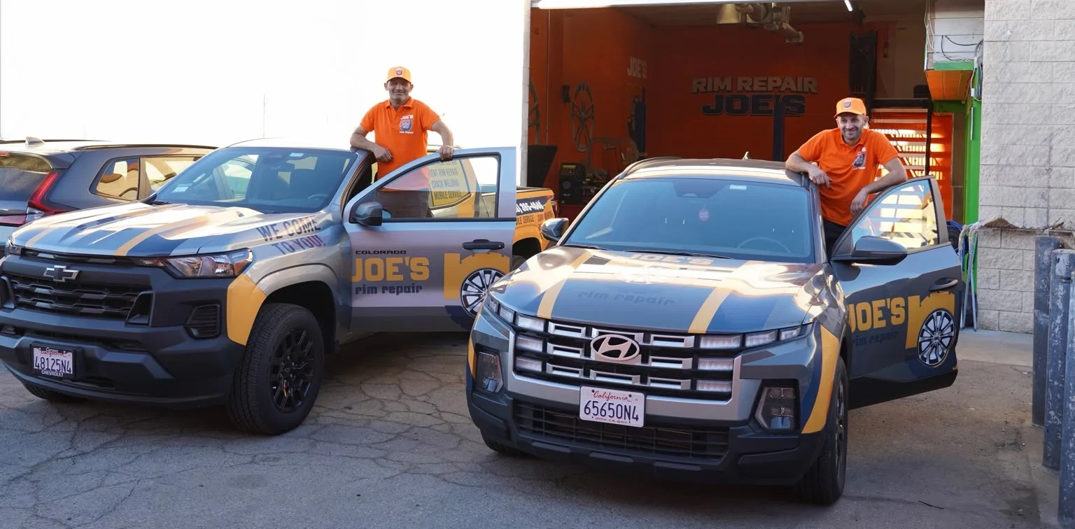 Joe's Rim Repair team with their mobile service trucks outside the Sun Valley shop